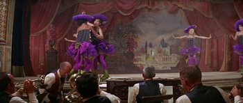 Movie still from “Funny Girl” (1968), directed by William Wyler – A couple of people that are on a stage; Wide shot, Over the shoulder angle