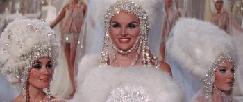 Movie still from “Funny Girl” (1968), directed by William Wyler – A woman in a white dress and a white veil; Close Up shot, Low angle