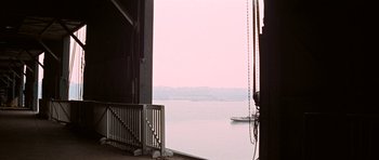 Movie still from “Funny Girl” (1968), directed by William Wyler – A view of a body of water from a pier; Extreme Wide shot, Low angle