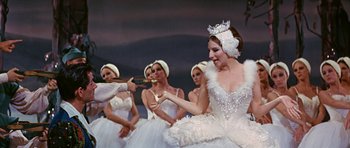 Movie still from “Funny Girl” (1968), directed by William Wyler – A group of women dressed as snow angels; Medium shot, Over the shoulder angle
