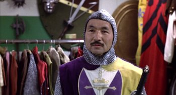 Movie still from “Futureworld” (1976), directed by Richard T. Heffron – A man in a suit of a medieval knight; Close Up shot, Low angle