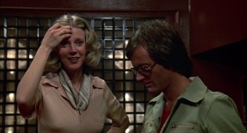 Movie still from “Futureworld” (1976), directed by Richard T. Heffron – A man and a woman standing next to each other; Close Up shot, Low angle