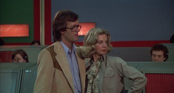 Movie still from “Futureworld” (1976), directed by Richard T. Heffron – A man and a woman standing next to each other; Medium shot, Low angle