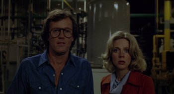 Movie still from “Futureworld” (1976), directed by Richard T. Heffron – A man and a woman standing next to each other; Close Up shot, Low angle