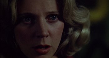 Movie still from “Futureworld” (1976), directed by Richard T. Heffron – A person with blonde hair and blue eyes; Close Up shot, Low angle