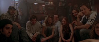 Movie still from “Garden State” (2004), directed by Zach Braff – A group of young people sitting in a room together; Medium shot, Low angle