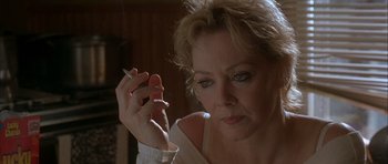 Movie still from “Garden State” (2004), directed by Zach Braff – A person holding a cigarette; Close Up shot, Over the shoulder angle