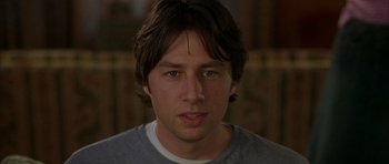 Movie still from “Garden State” (2004), directed by Zach Braff – A man's face in a gray shirt; Close Up shot, Low angle