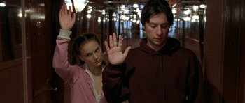 Movie still from “Garden State” (2004), directed by Zach Braff – A man and a woman standing next to each other; Medium shot, Over the shoulder angle