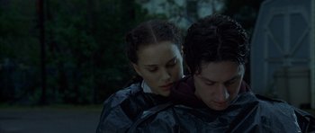 Movie still from “Garden State” (2004), directed by Zach Braff – A man and a woman wrapped in a tarpaulin; Close Up shot, Over the shoulder angle