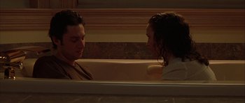 Movie still from “Garden State” (2004), directed by Zach Braff – A man and a woman sitting in a bath tub; Medium shot, High angle