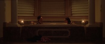 Movie still from “Garden State” (2004), directed by Zach Braff – A man and a woman sitting in a bath tub; Wide shot, Overhead angle
