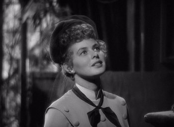 Movie still from “Gaslight” (1944), directed by George Cukor – An old photo of a woman with a hat on; Close Up shot, Low angle