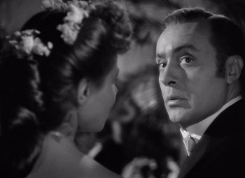 Movie still from “Gaslight” (1944), directed by George Cukor – A man and a woman looking at one another; Close Up shot, Over the shoulder angle