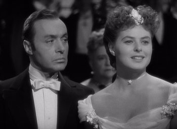 Movie still from “Gaslight” (1944), directed by George Cukor – A man and a woman standing next to each other; Close Up shot, Over the shoulder angle
