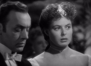 Movie still from “Gaslight” (1944), directed by George Cukor – A man and a woman standing next to each other; Close Up shot, Over the shoulder angle