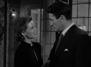 Movie still from “Gentleman's Agreement” (1947), directed by Elia Kazan – A man and a woman talking to each other; Medium shot, High angle