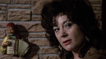 Movie still from “Get Carter” (1971), directed by Mike Hodges – A person wearing a dress; Close Up shot, Over the shoulder angle