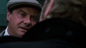 Movie still from “Get Carter” (1971), directed by Mike Hodges – A person looking at another person; Close Up shot, Over the shoulder angle