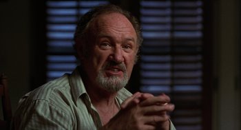 Movie still from “Get Shorty” (1995), directed by Barry Sonnenfeld – An older man with a goatee and a beard; Close Up shot, Low angle