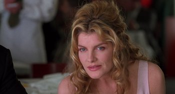 Movie still from “Get Shorty” (1995), directed by Barry Sonnenfeld – A person with long blonde hair; Close Up shot, Low angle