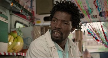 Movie still from “Ghost Dog: The Way of the Samurai” (1999), directed by Jim Jarmusch – A person wearing a jacket; Close Up shot, Low angle