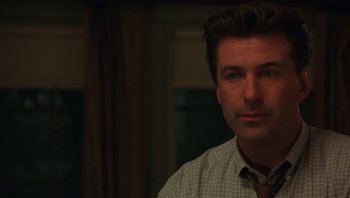 Movie still from “Ghosts of Mississippi” (1996), directed by Rob Reiner – A person wearing a shirt and a tie; Close Up shot, Over the shoulder angle