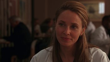 Movie still from “Ghosts of Mississippi” (1996), directed by Rob Reiner – A person with long hair; Close Up shot, Over the shoulder angle