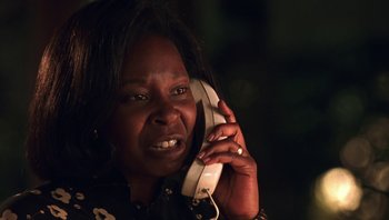 Movie still from “Ghosts of Mississippi” (1996), directed by Rob Reiner – An older woman holding a phone up to her ear; Close Up shot, Low angle
