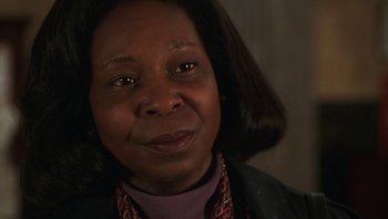 Movie still from “Ghosts of Mississippi” (1996), directed by Rob Reiner – A person wearing a jacket; Close Up shot, High angle