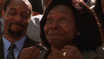 Movie still from “Ghosts of Mississippi” (1996), directed by Rob Reiner – An older woman is crying in front of an older man; Close Up shot, Low angle