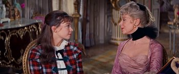 Movie still from “Gigi” (1958), directed by Vincente Minnelli – Two women are talking to each other in a room; Close Up shot, Over the shoulder angle