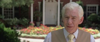 Movie still from “Gods and Monsters” (1998), directed by Bill Condon – An older man wearing a vest and a striped tie; Close Up shot, Low angle
