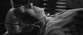 Movie still from “Gods and Monsters” (1998), directed by Bill Condon – A black and white photo of a man laying in bed; Close Up shot, High angle