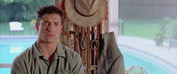Movie still from “Gods and Monsters” (1998), directed by Bill Condon – A young man in a plaid shirt and a hat; Close Up shot, Over the shoulder angle