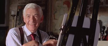 Movie still from “Gods and Monsters” (1998), directed by Bill Condon – An older man holding a painting in front of him; Close Up shot, Low angle