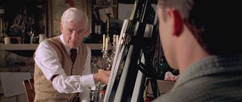 Movie still from “Gods and Monsters” (1998), directed by Bill Condon – An older man sitting in front of an easel; Close Up shot, Over the shoulder angle