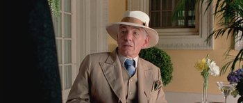 Movie still from “Gods and Monsters” (1998), directed by Bill Condon – An older man wearing a suit and a hat; Close Up shot, Low angle