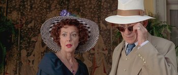 Movie still from “Gods and Monsters” (1998), directed by Bill Condon – A woman wearing a hat standing next to a man wearing a hat; Close Up shot, Over the shoulder angle