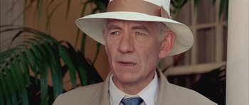 Movie still from “Gods and Monsters” (1998), directed by Bill Condon – An older man wearing a white hat and a suit; Close Up shot, Low angle