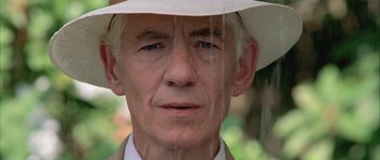 Movie still from “Gods and Monsters” (1998), directed by Bill Condon – An older man wearing a white hat and a suit; Close Up shot, Low angle