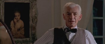 Movie still from “Gods and Monsters” (1998), directed by Bill Condon – An older man in a vest and bow tie; Close Up shot, Low angle