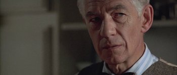 Movie still from “Gods and Monsters” (1998), directed by Bill Condon – An older man wearing a suit and bow tie; Close Up shot, Low angle