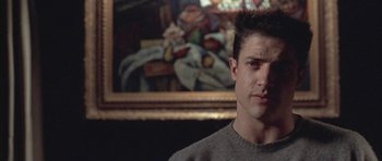 Movie still from “Gods and Monsters” (1998), directed by Bill Condon – A man in front of a painting in a room; Close Up shot, Low angle
