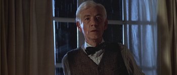 Movie still from “Gods and Monsters” (1998), directed by Bill Condon – An older man wearing a vest and a bow tie; Close Up shot, Low angle