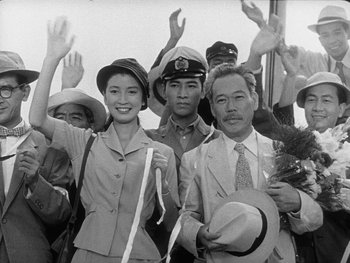 Movie still from “Godzilla: King of the Monsters!” (1956), directed by Ishirô Honda – A group of people standing next to each other; Medium shot, Low angle