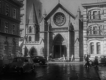 Movie still from “Going My Way” (1944), directed by Leo McCarey – An old black and white photo of a church; Extreme Wide shot, Low angle