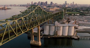 Movie still from “Gone Baby Gone” (2007), directed by Ben Affleck – An aerial view of a bridge over a body of water; Extreme Wide shot, High angle