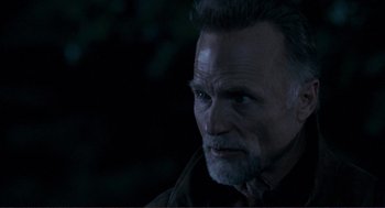 Movie still from “Gone Baby Gone” (2007), directed by Ben Affleck – A person wearing a jacket; Close Up shot, Over the shoulder angle