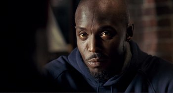 Movie still from “Gone Baby Gone” (2007), directed by Ben Affleck – A person wearing a hooded sweatshirt; Close Up shot, Low angle